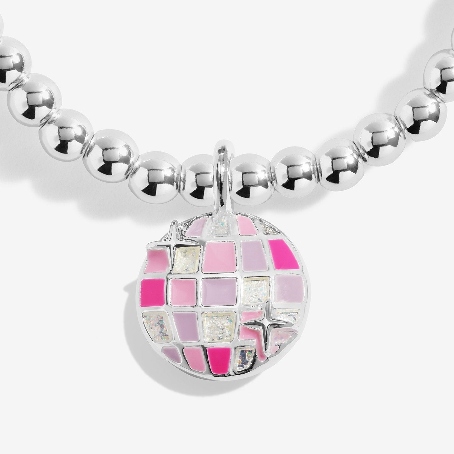 A silver beaded necklace with a round disco ball charm featuring pink and light purple mosaic tiles, shown on a light gray background.