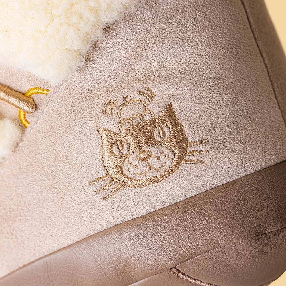 close up of Jellycat Amuseables Perta Snow Boot showing jellycat logo