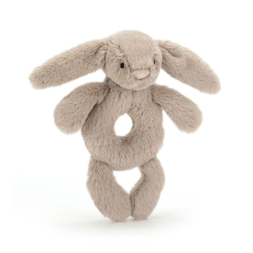 Plush bunny rattle toy on a white background. Bashful Beige Bunny Ring Rattle by Jellycat