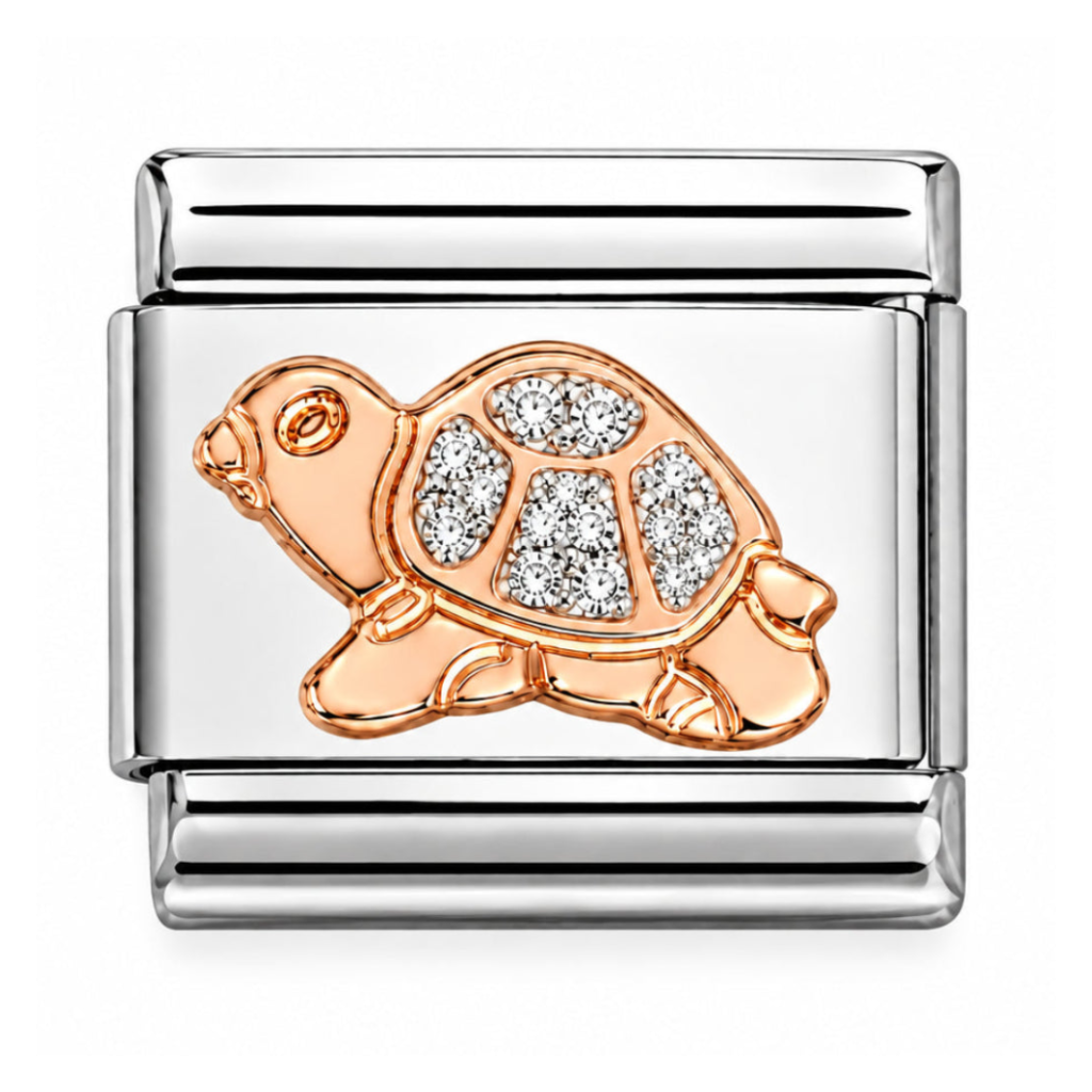 A Nomination Italy rose gold charm link featuring a rose gold turtle charm embellished with clear rhinestones on a white background.