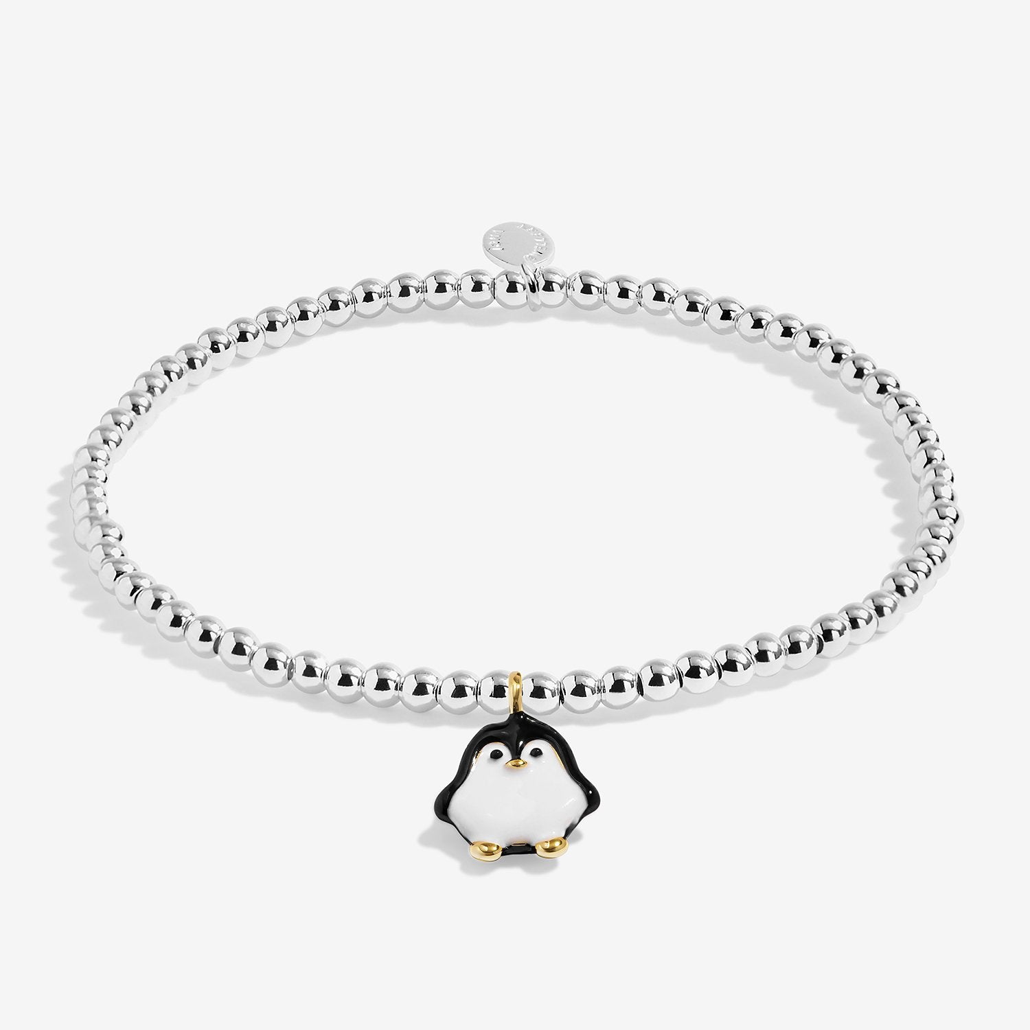 Silver-plated bracelet with a penguin charm on a white background