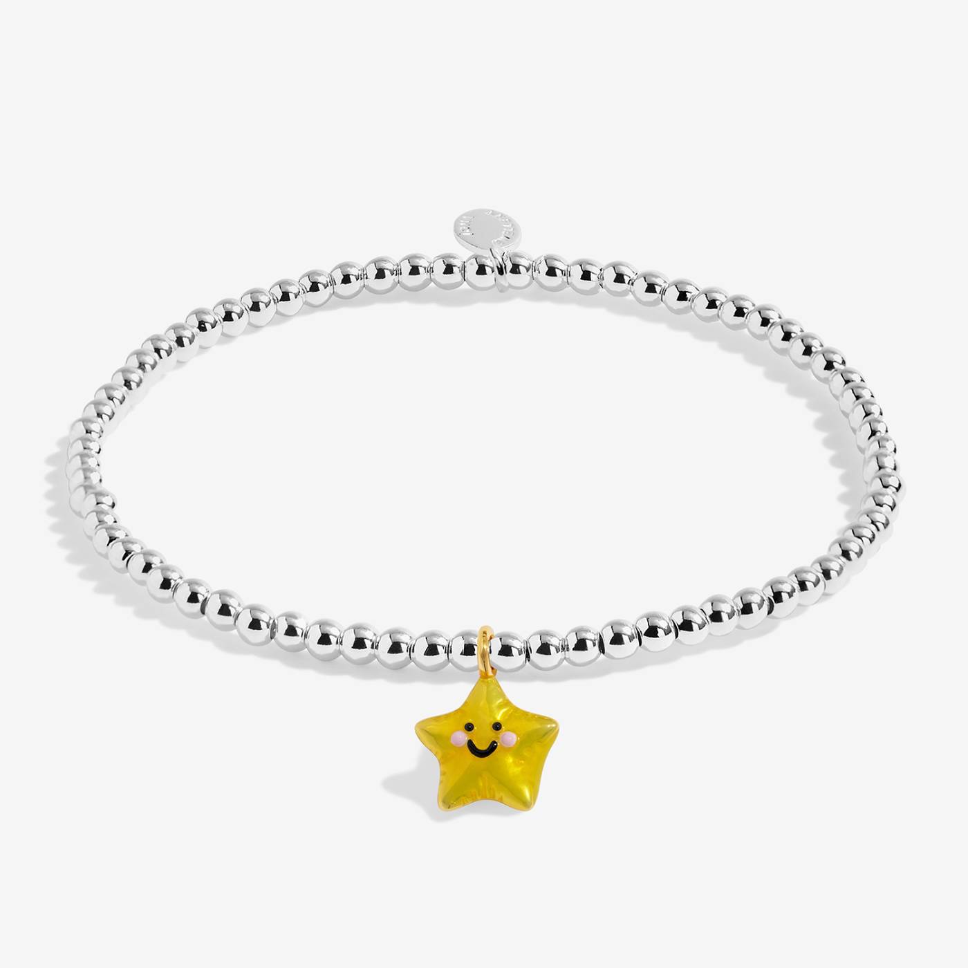 Silver-plated beaded bracelet with a yellow star charm on a white background