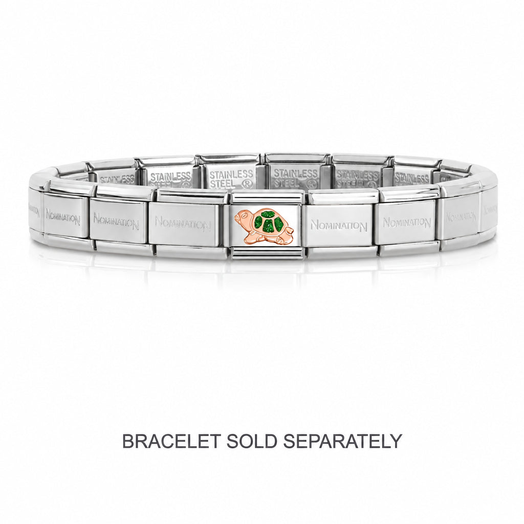 Nomination Rose gold with green glitter turtle charm. Showing how the charm looks when placed on composable bracelet. Bracelet sold separately to charm.