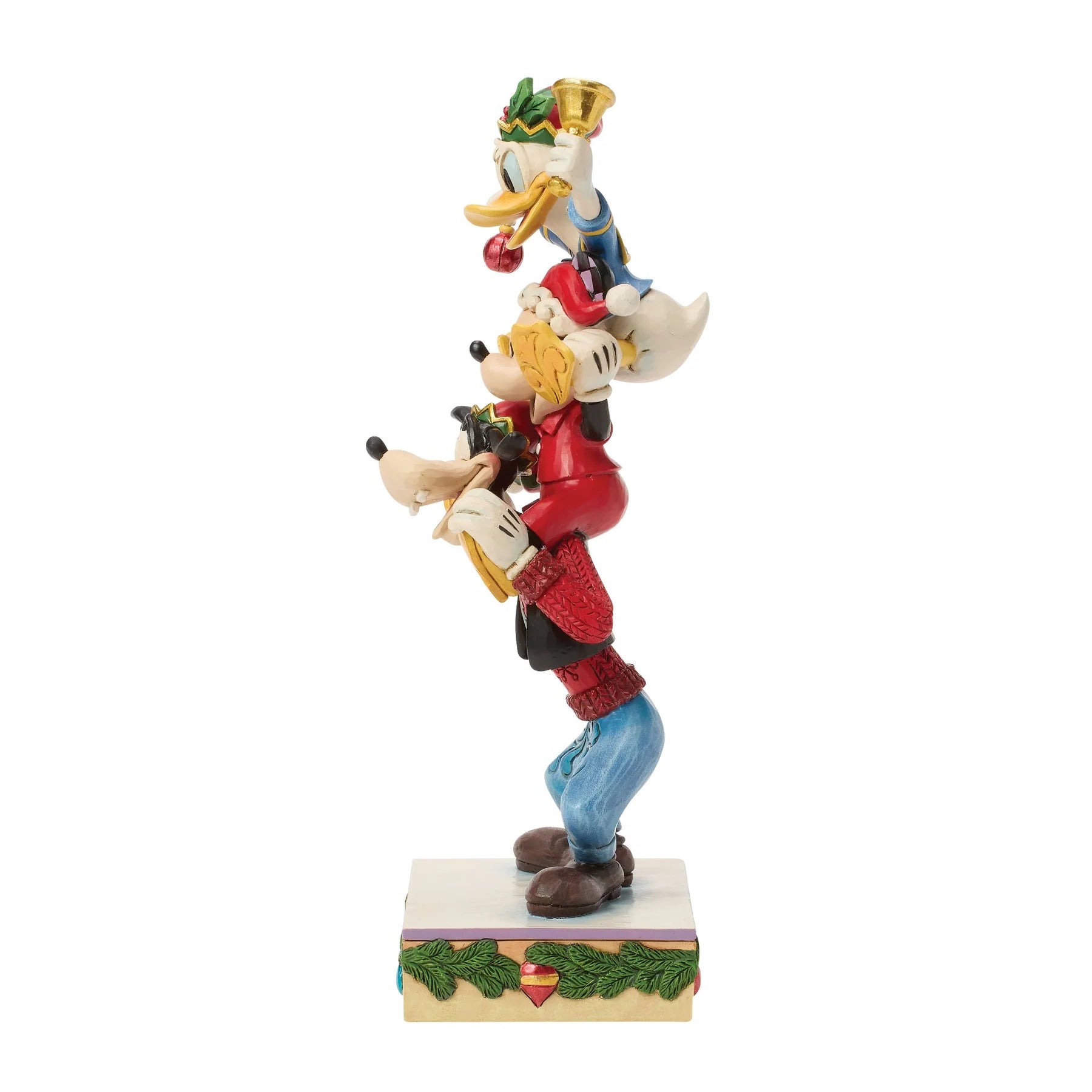Animated character figurine featuring Donald Duck, Mickey Mouse & Goofy facing side on with white background