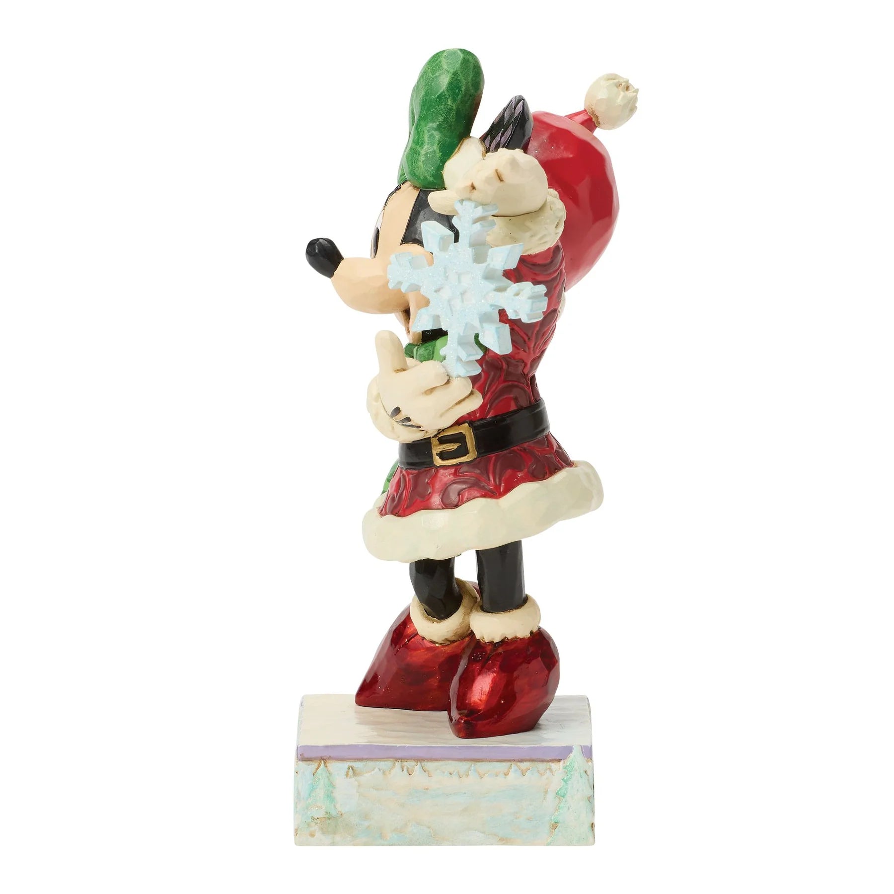 Minnie Mouse Figurine of a character in a Santa outfit holding a snowflake and green item on a white background