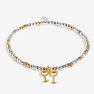 A delicate beaded Joma Jewellery bracelet with  gold coloured glasses  charm.