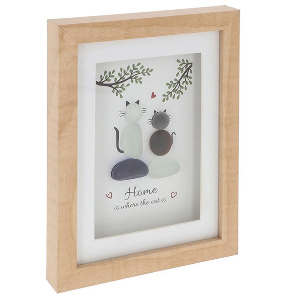 Wooden plaque with glass pebbles in the shape of cats with the sentiment home is where the cat is