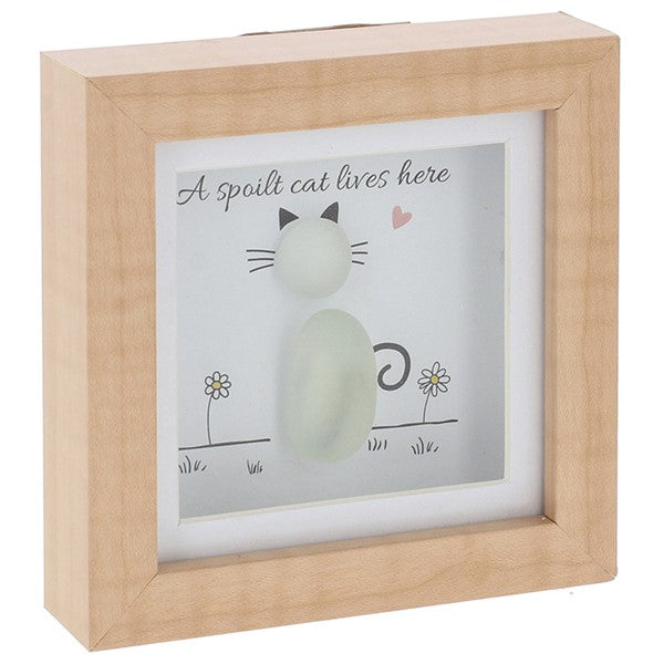 Wooden frame with glass pebble artwork in the shape of a cat with the sentiment a spoilt cat lives here