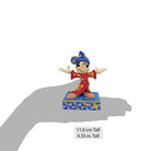 Figurine of a character in a red outfit with a blue hat on a white background