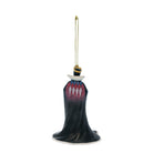 A hanging Christmas ornament shaped like a vampire's back, featuring a black cloak, a white collar, and a pink and blue harlequin pattern on the upper back, suspended by a gold string against a white background.
