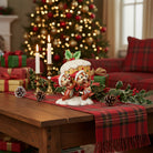 A festive collectible figurine of Chip & Dale chipmunks carrying a large decorated Christmas pudding. The figurine is set against a Christmas background, with the characters holding a pudding & wearing holiday attire including red Santa hats and colorful ornaments.
