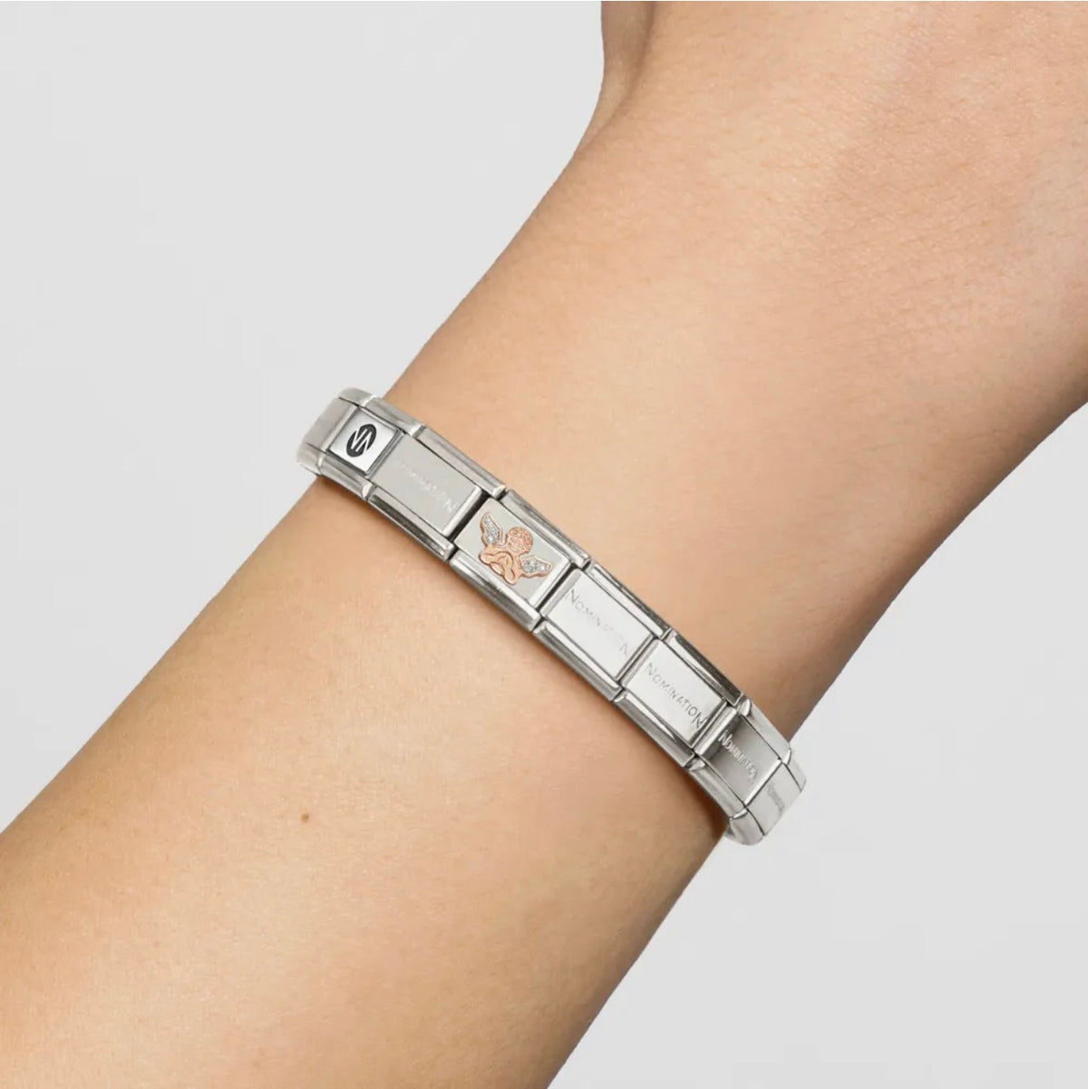 Image showing Nomination Italy classic composable bracelet featuring a 9k gold angel charm with silver enamelled glitter detailing 