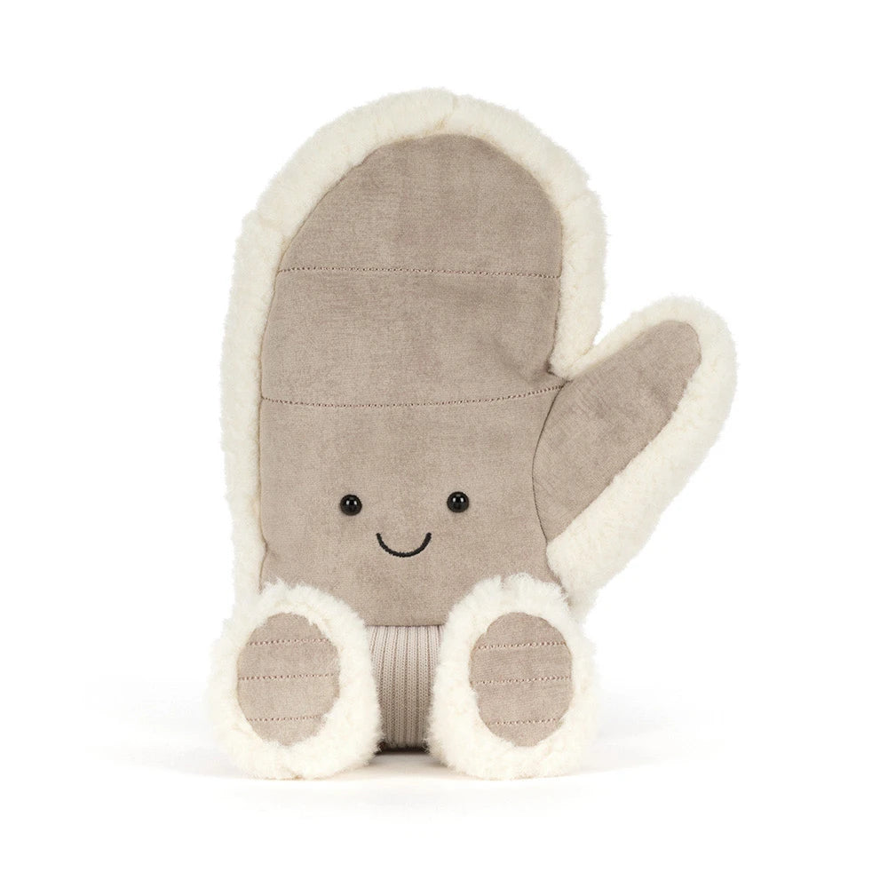 Jellycat amuseables mitten plush  toy in a warm taupe-brown fabric with cream sherpa trim, featuring a simple embroidered smiley face and small feet, shown on a clean white background.