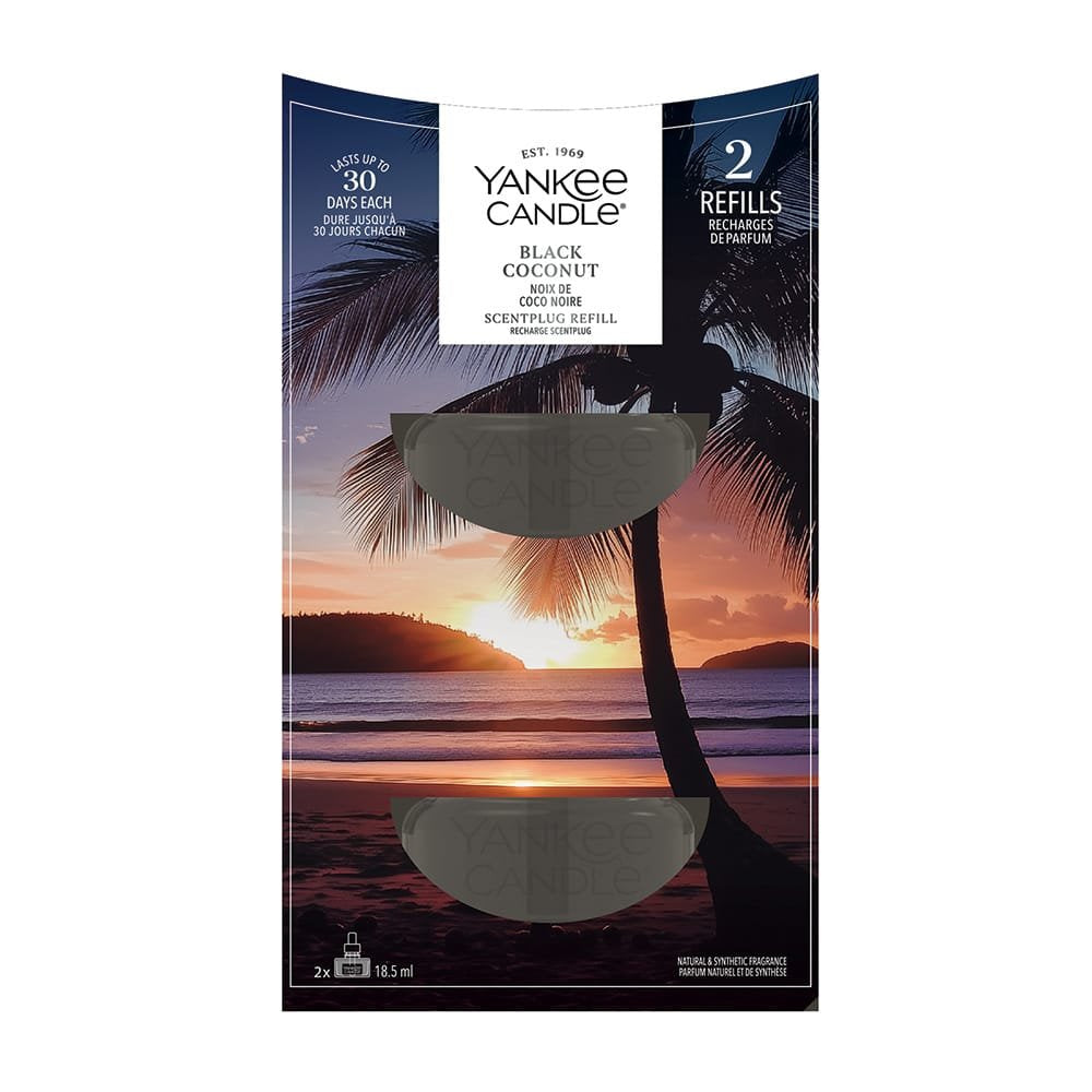 Yankee Candle Black Coconut scented plug refill packaging with sunset and palm tree design.