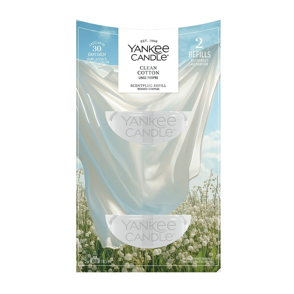 Yankee Candle Clean Cotton scent plug refills packaging with a scenic background