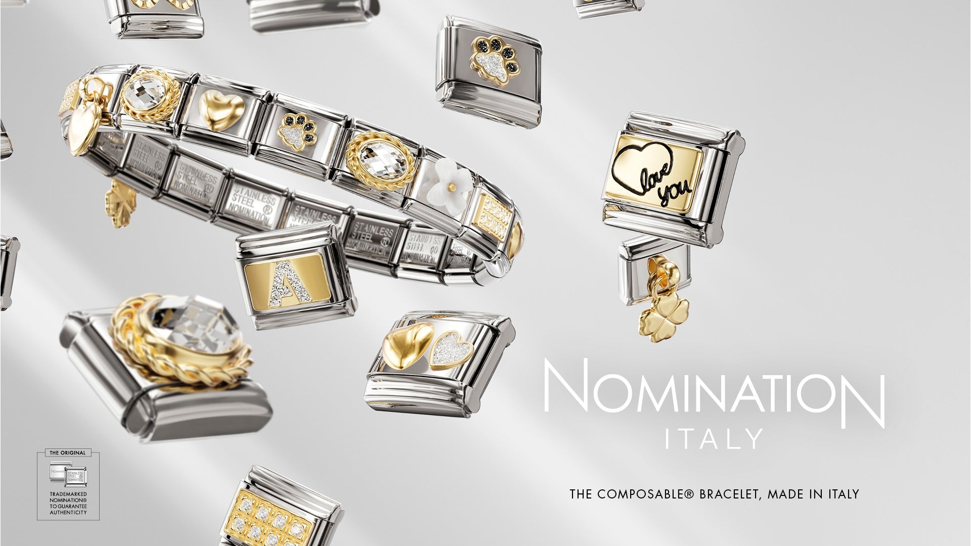 Nomination Italy bracelet with various charms on a light gray background