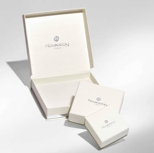 Nomination jewellery box packaging on a light gray background