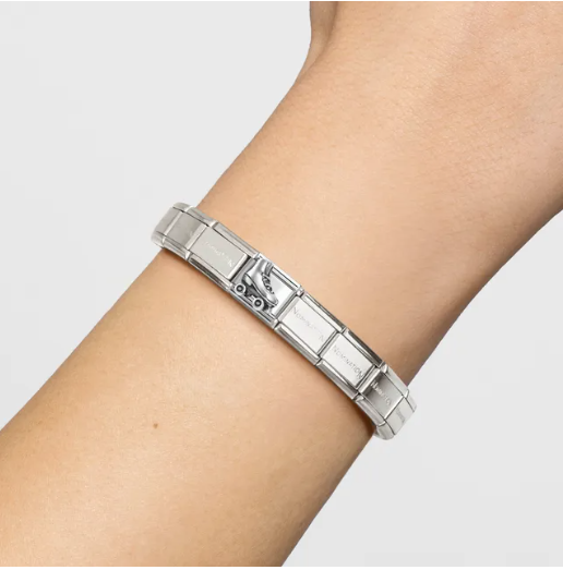 Image of a sterling silver composable charm of a roller skate  on the classic Nomination Italy composable bracelet 