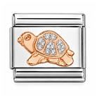 A Nomination Italy rose gold charm link featuring a rose gold turtle charm embellished with clear rhinestones on a white background.
