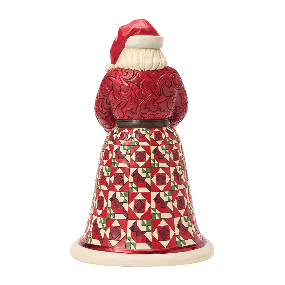 The back of this Decorative figure of Santa Claus, wearing a red patterned coat and Santa hat on a white background