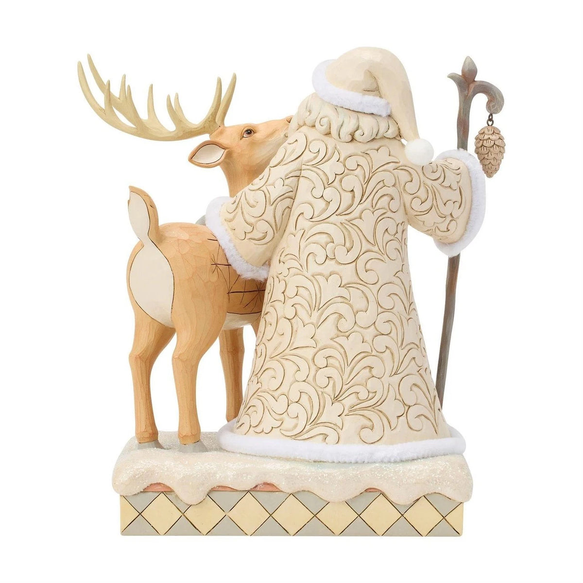 Decorative figurine of a Santa Claus with a reindeer on a white background