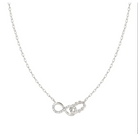Silver necklace with a heart and infinity symbol pendant on a white background