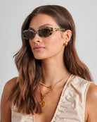 Woman wearing Nissi slim oval susunglasses 