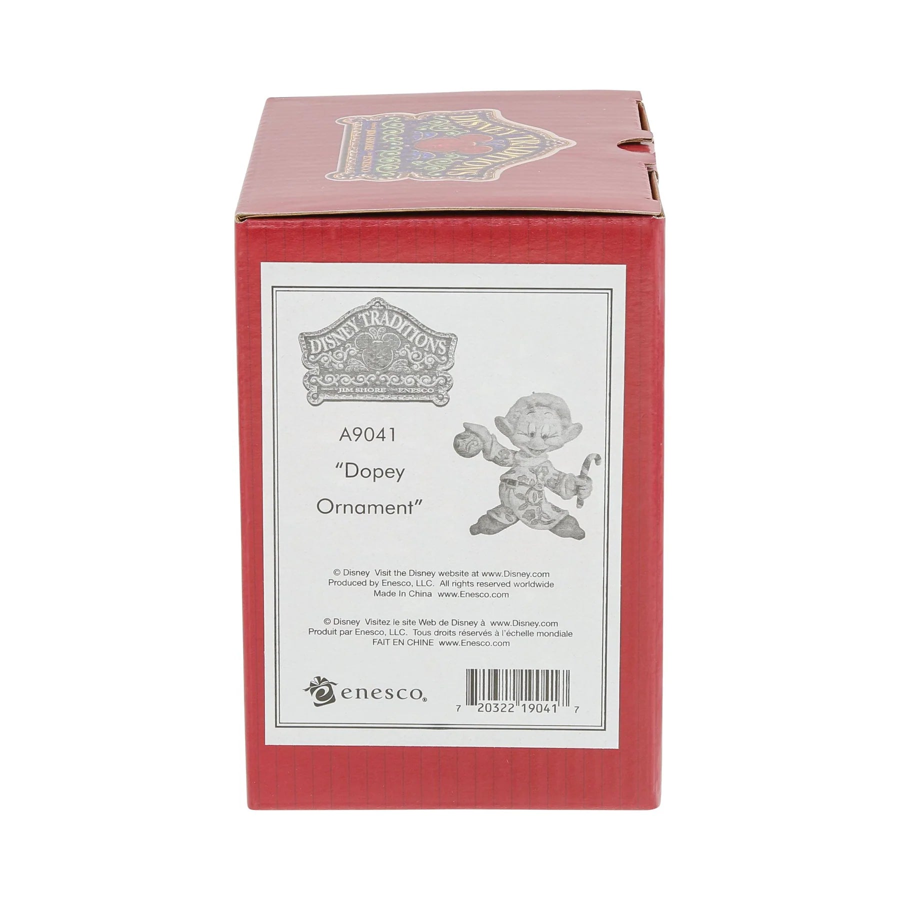 A red rectangular product box with a white front label reading 'Disney Traditions "Dopey Ornament"' and showing a small illustration of Dopey, photographed on a plain white background.