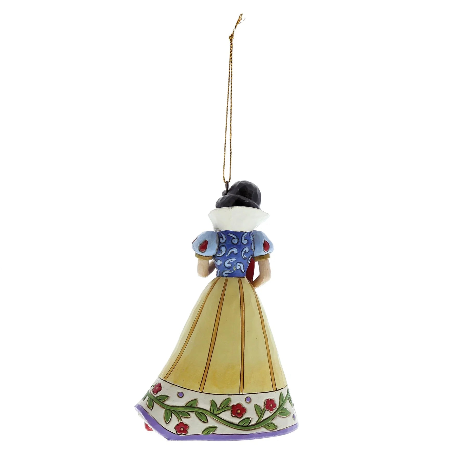 Decorative ornament of a character in a blue dress with a yellow skirt on a white background