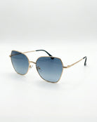 Gold-framed sunglasses with Black lenses on a white background