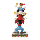 Animated character figurine featuring Donald Duck, Mickey Mouse & Goofy with festive colorful outfits on a white background