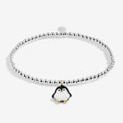 Silver-plated bracelet with a penguin charm on a white background