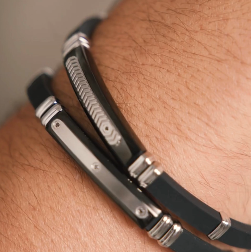 Close up image of Nomination Italy City collection showing a black rubber and steel bracelets with cubic zirconia 