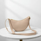 Katie Loxton large Harley sling shoulder bag on a marble table