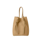 Tan suedette bucket bag on a white background