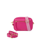 Pink crossbody bag from the brand Katie Loxton with additional strap on a white background