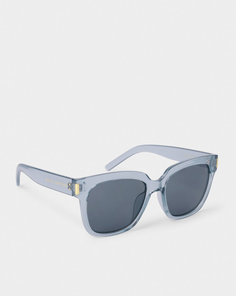 katie loxton Roma Sunglasses with gold frame and reflective lenses on a white background