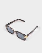 katie loxton malibu tortoiseshell Sunglasses with tortoiseshell frame and gold accents on a white background