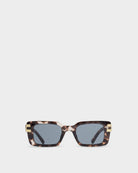 katie loxton malibu tortoiseshell Sunglasses with tortoiseshell frame and blue lenses on a white background