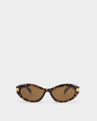 katie loxton Sunglasses with tortoiseshell frame and brown lenses on a white background