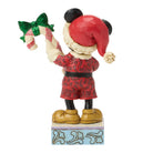 Mickey Mouse Figurine in a red Santa outfit with a candy cane and green bow on a white background