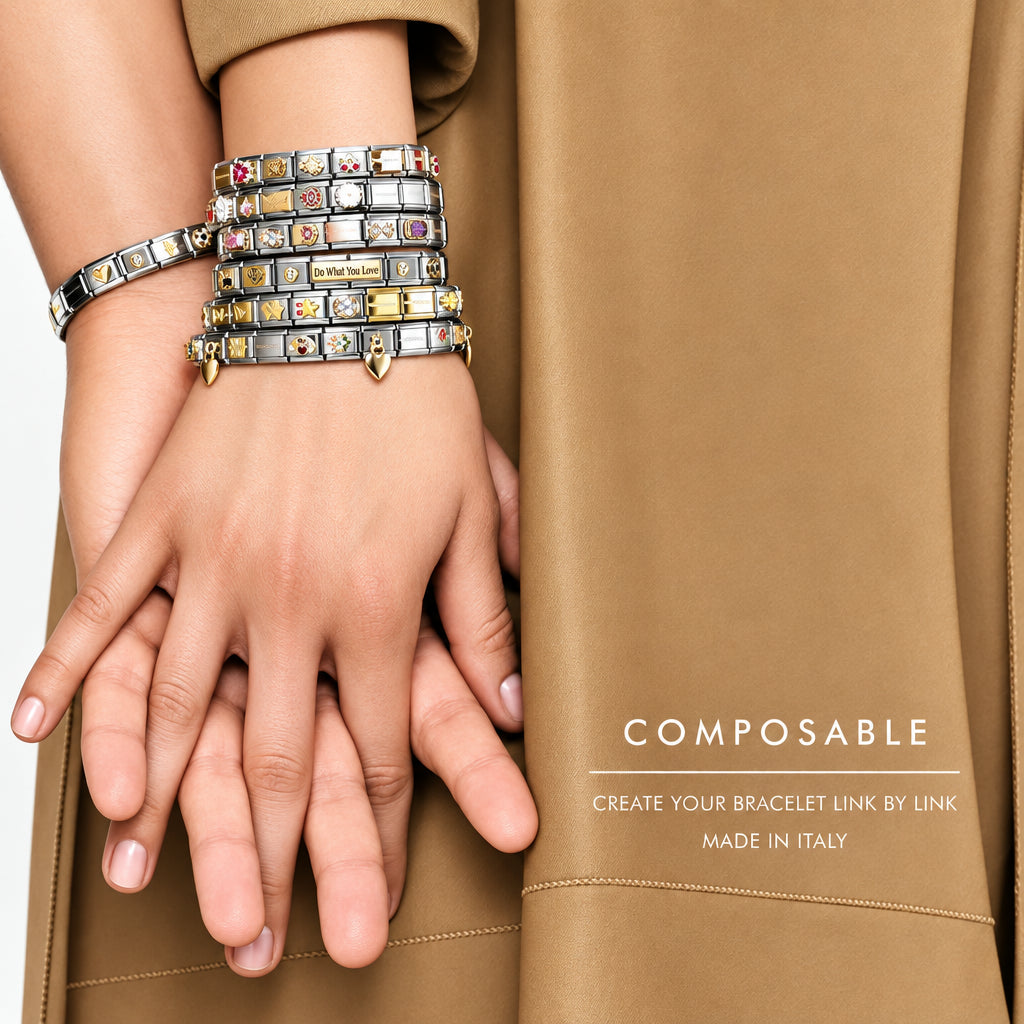 Image showing close up of interlocking hands wearing multiple composable Nomination Italy bracelets 
