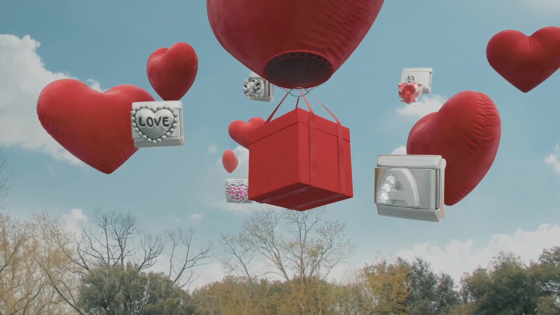 short video advertisement, showcasing the Nomination Italy silver collection. Individual Silver charms floating around gift in the shape of a hot air balloon.
