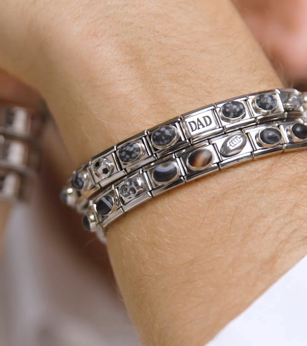 Close up image of nomination italy composable bracelets on a wrist