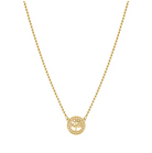 Gold necklace with a tree of life pendant on a white background