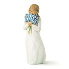 willow tree forget me not Figurine of a woman holding blue flowers against a white background