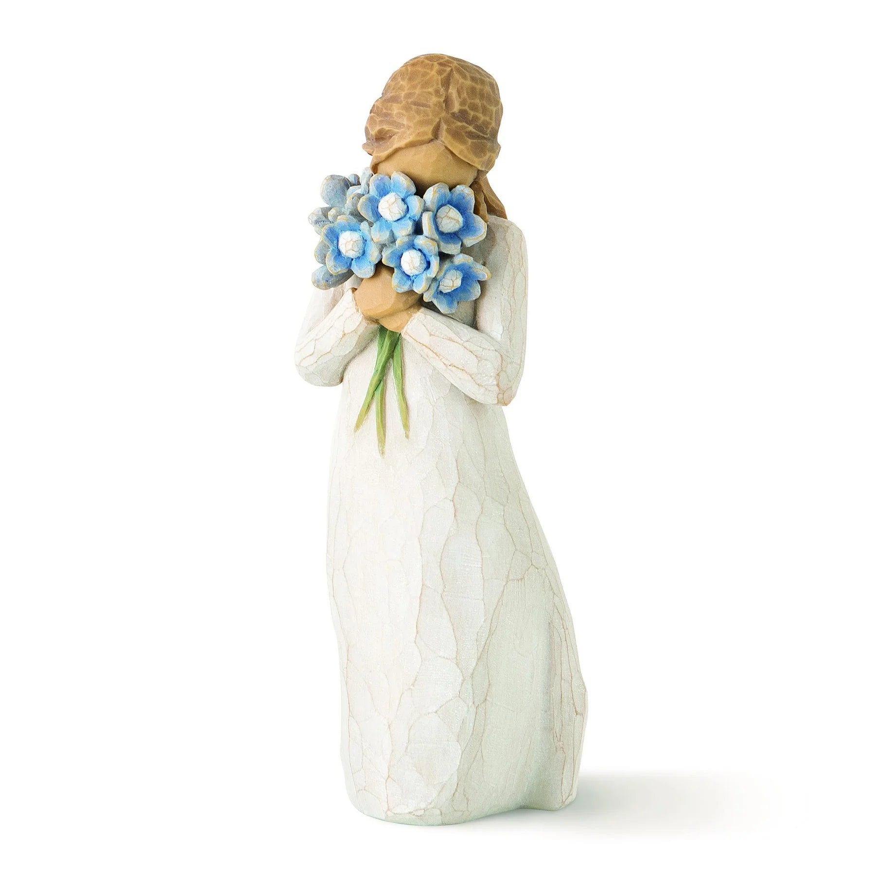 willow tree forget me not Figurine of a woman holding blue flowers against a white background